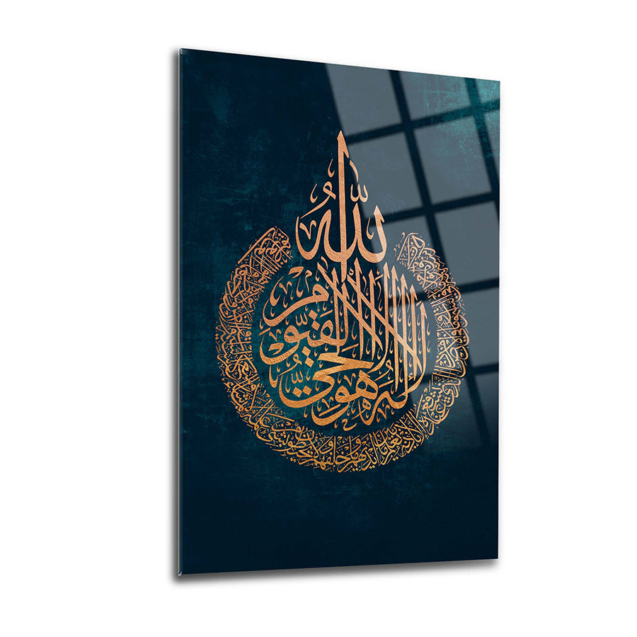 Ayetel Kürsi art piece on glass featuring intricate Arabic calligraphy in gold tones.