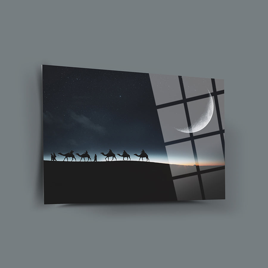 Hicret Cam Tablo featuring a silhouette of camels against a night sky with a crescent moon.