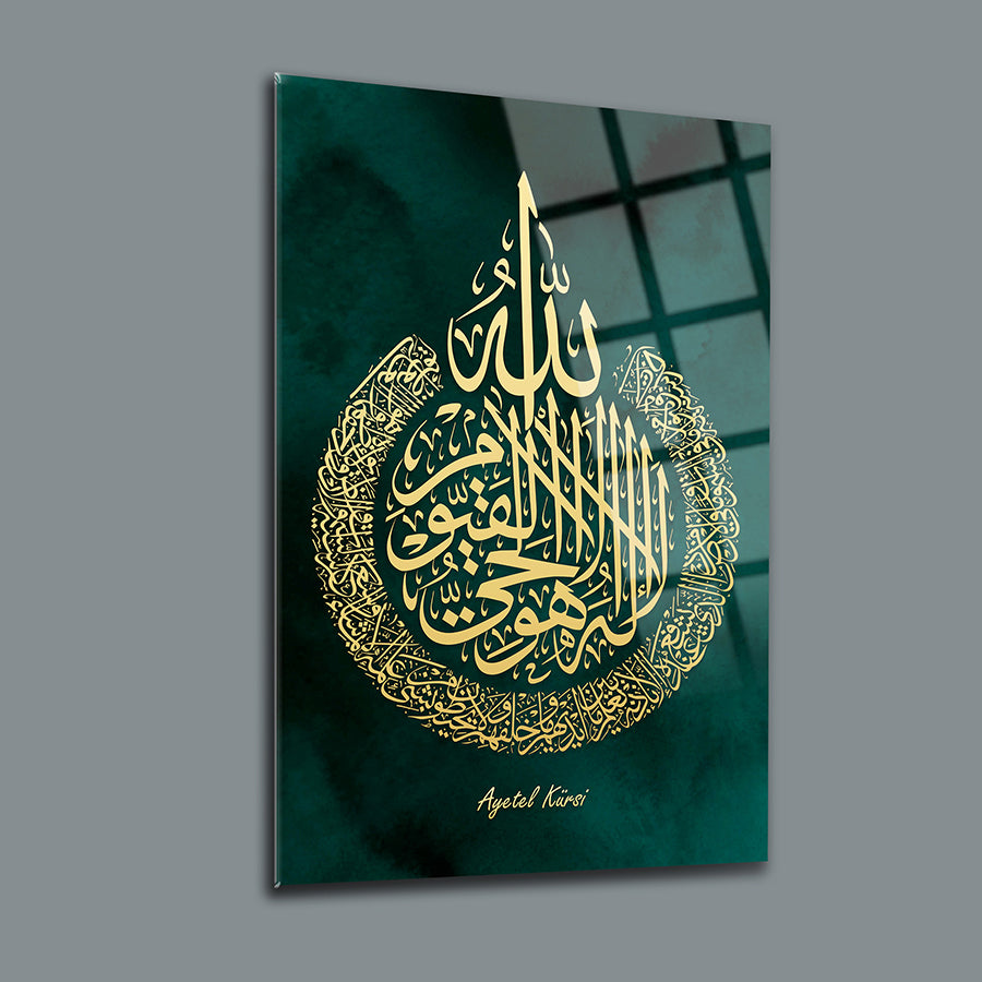 Ayetel Kürsi glass wall art featuring intricate Arabic calligraphy on a green background.