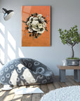 Modern living room featuring Floş Cam Tablo art piece above a cozy bean bag chair and decorative plants.