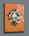 Floş Cam Tablo with vibrant flowers on an orange background, showcasing high-quality UV printing.