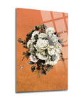 Floş Cam Tablo with floral design on an orange background, showcasing high-quality UV printing.