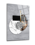 Modern art print featuring abstract shapes in marble and textured finishes on a gray background.