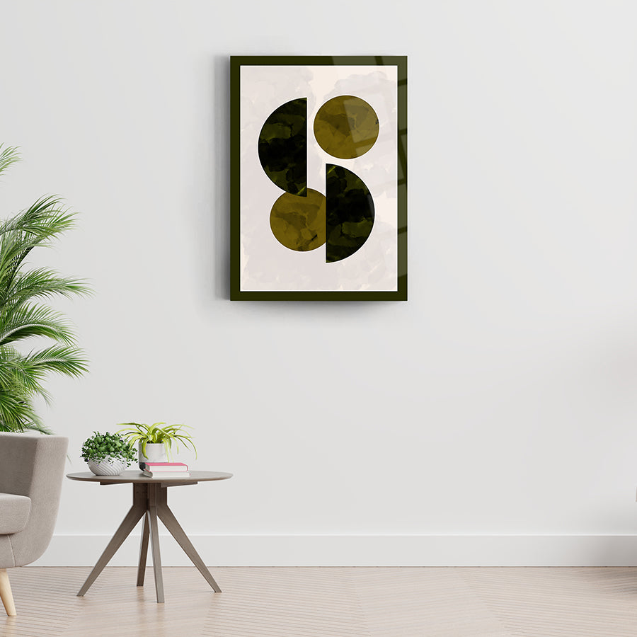 Modern art print featuring abstract circular shapes in earthy tones, displayed on a minimalistic wall with greenery.