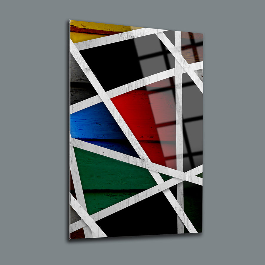 Modern glass wall art featuring colorful geometric patterns and textured background.