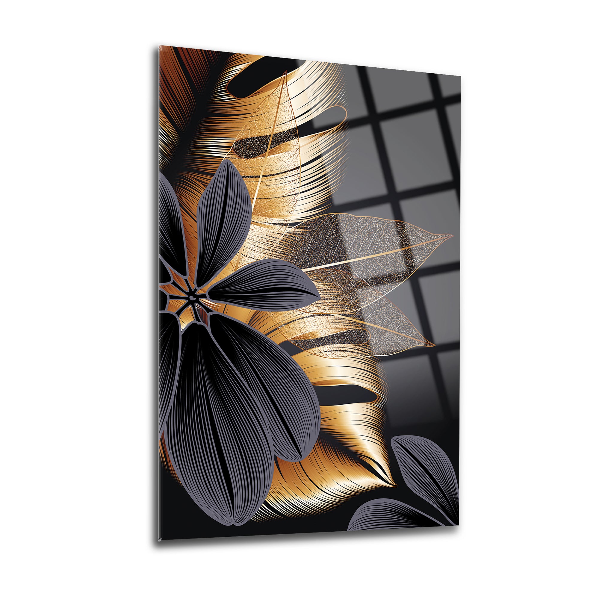 Altın yapraklar ve siyah çiçeklerle dekoratif cam tablo, modern iç mekanlara şıklık katar.