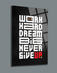 Inspirational wall art with motivational text: 'Work Hard, Dream Big, Never Give Up' on a stylish black background.