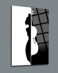 Stylish silhouette art of a woman with a cello on a black and white backdrop, perfect for modern home decor.