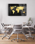 Stylish gold world map glass art on display in a modern office setting with minimalist furniture.