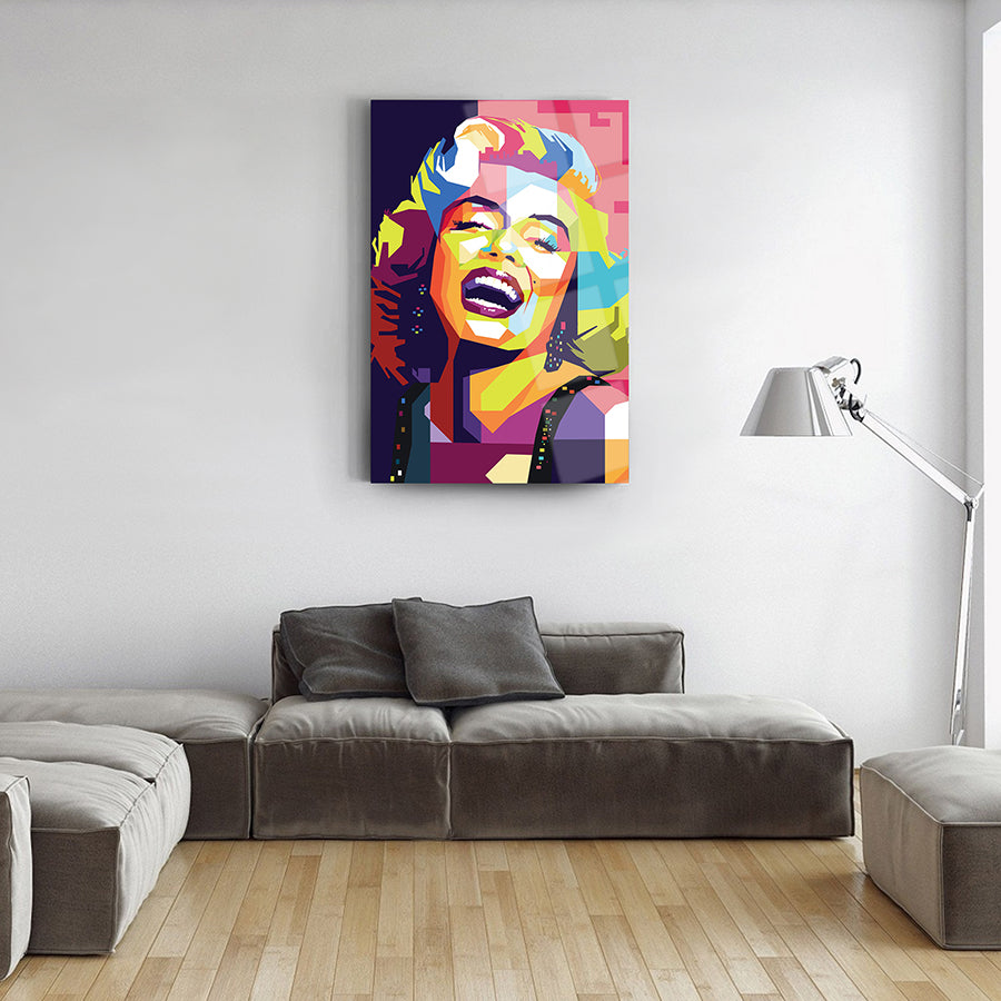 Vibrant Marilyn Monroe glass artwork in a modern living room, showcasing colorful design and stylish decor.