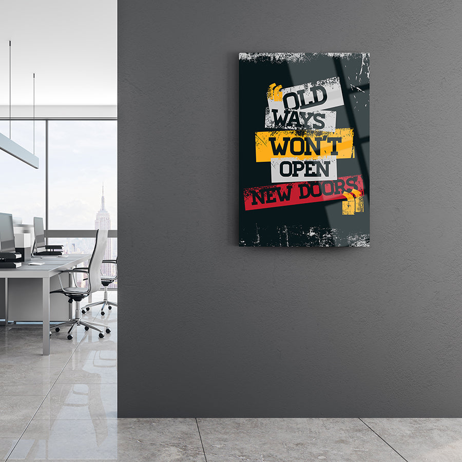 Modern cam tablo featuring motivational quote "Old ways won't open new doors" in a contemporary office setting.