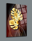 Gold Palmiye Cam Tablo with elegant leaf design on a dark background, showcasing modern art style.