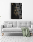 Stylish Kuru Kafa cam tablo with gold accents displayed above a modern gray sofa in a chic living room.