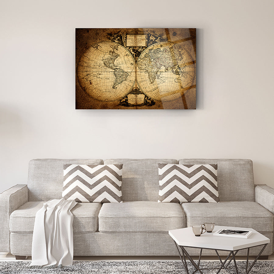 Vintage world map glass wall art displayed above a modern sofa in a stylish living room.