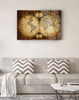 Vintage world map glass wall art displayed above a modern sofa in a stylish living room.