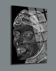 Stylish black and white art piece featuring intricate line drawings of a face on a glass surface.