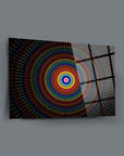 Colorful circular artwork on glass, featuring vibrant patterns and a modern design for stylish home decor.