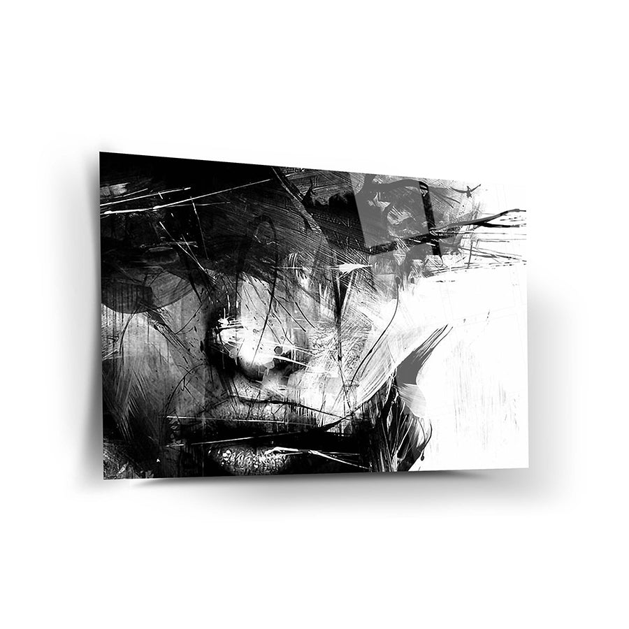 Esrarengiz kadın temalı siyah-beyaz cam tablo, modern sanatın etkileyici bir örneği.