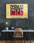 Thought-provoking wall art with text 'You are still hidden deep in my mind' in a stylish office setting.