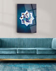 Selçuklu Motifi Cam Tablo on wall above elegant teal couch, showcasing intricate design and vibrant colors.