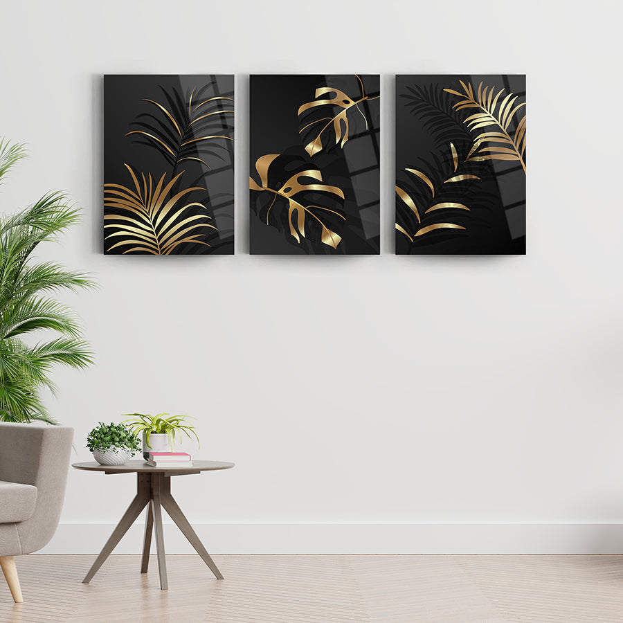 Altın Yelpaze Yaprak 3'lü Set Cam Tablo, şık ve modern tasarım, duvar dekorasyonu için mükemmel tercih.