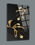 Altın yaprak desenli 3'lü set cam tablo, modern iç mekan dekorasyonu için şık bir parça.