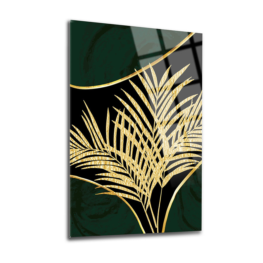 Gold leaf design on dark green glass wall art, adding elegance and style to any decor.