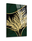 Gold leaf design on dark green glass wall art, adding elegance and style to any decor.
