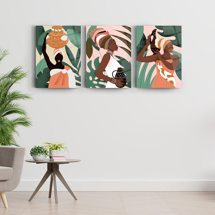 Afrikalı Kadın-2 3'lü Set Cam Tablo; modern sanat, sıcak renkler, tropikal yapraklar, zarif tasarım.