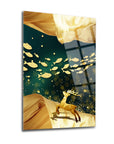 Artistic glass wall art featuring a golden deer among swirling fish in a vibrant underwater scene.