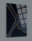 Modern black glass wall art with golden accents, showcasing a sleek geometric design.