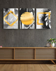 Modern abstract design set of three glass wall art pieces featuring geometric shapes in black and gold.