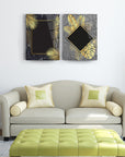 Modern 2-piece glass wall art set featuring tropical leaf designs in a stylish living room setting.