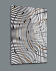 Modern circular pattern glass wall art, featuring black, white, and gold accents on sleek tempered glass.