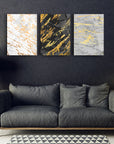 Modern 3-piece glass wall art set with marble designs in gold and black, perfect for stylish home decor.