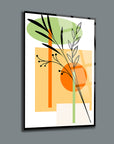 Modern glass wall art featuring abstract plant design in vibrant colors and geometric shapes.