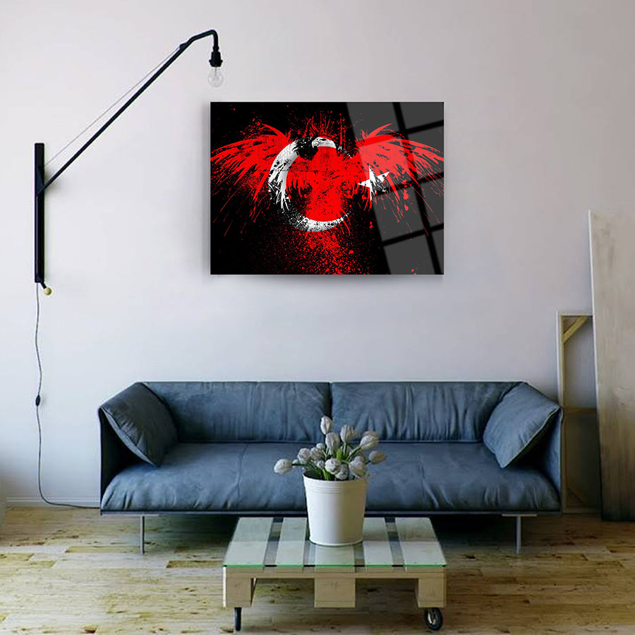 Modern red-themed wall art featuring an abstract design above a stylish sofa in a contemporary living space.