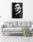 Atatürk 54 Cam Tablo on modern living room wall above sofa with cushions and plant.