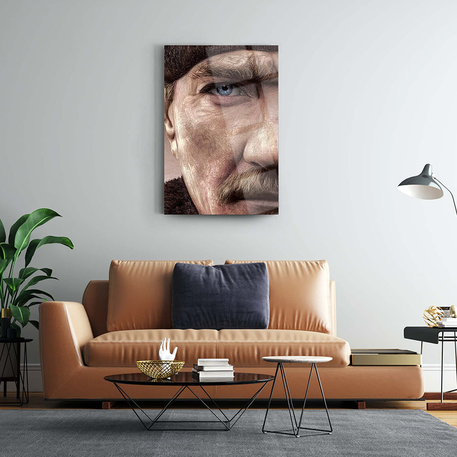 Atatürk 63 Cam Tablo on wall above a stylish sofa in modern living room setting, featuring unique UV printing.