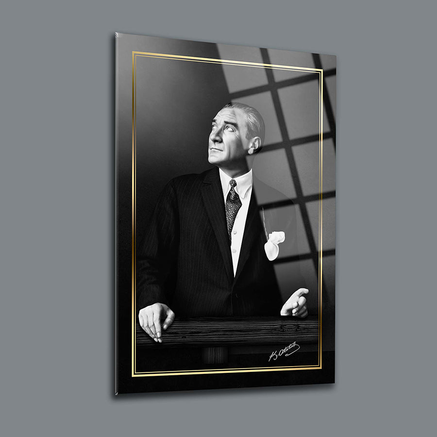 Artistic black and white portrait of a distinguished man in a formal suit, against a modern backdrop.