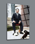 Atatürk 75 Cam Tablo with a serene image of a man in a suit sitting with playful puppies.