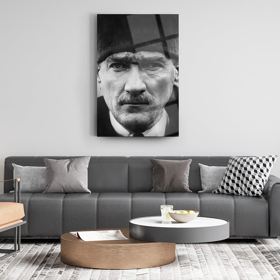 Black and white portrait of a historical figure on a modern living room wall, enhancing stylish decor.