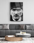 Black and white portrait of a historical figure on a modern living room wall, enhancing stylish decor.