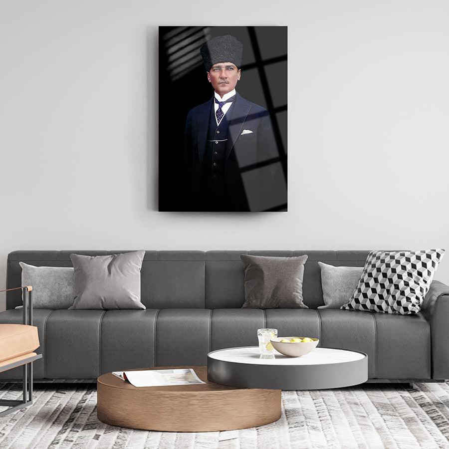 Elegant living room featuring Atatürk 103 cam tablo artwork on the wall above a modern sofa.