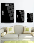 Modern living room showcasing three stylish black glass wall art pieces in various sizes: 100cm, 70cm, and 45cm.