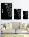 Three sizes of Atatürk 65 Cam Tablo displayed on a wall above a modern sofa, showcasing artistic design options.