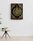Ayetel Kürsi 3 Cam Tablo in black and gold design, showcased on a modern wall with plant and table decor.