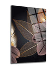 Artistic glass wall art featuring golden leaf designs on a dark background, perfect for modern decor.
