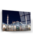 Süleymaniye Mosque glass art piece showcasing intricate architecture at night.