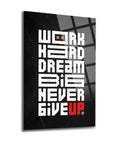 Motivational glass wall art with inspiring quote: 'Work Hard, Dream Big, Never Give Up' on a black background.